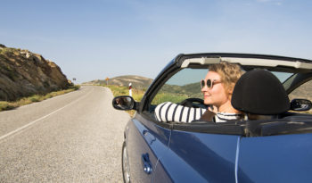 woman-driving-car-in-greece